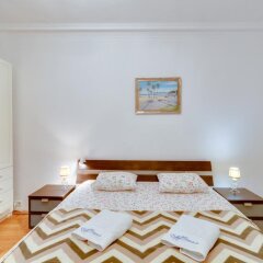 Апартаменты EnjoyMoscow Pushkin & Red Square Apartments Москва комната для гостей фото 2