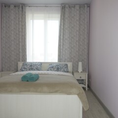 Апартаменты LUXKV Apartment on Nikoloyamskiy 3A комната для гостей фото 4
