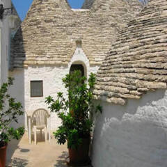 Отель Trulli Family Альберобелло