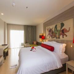 Отель Ramada by Wyndham Phuket Deevana Patong Стандартный номер с различными типами кроватей фото 7