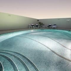 Auris Hotel Apartments Deira Дубай бассейн фото 3