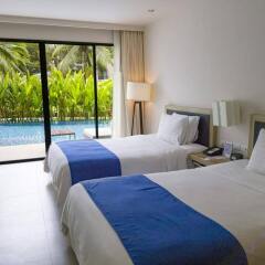 Отель Holiday Inn Resort Phuket Mai Khao Beach пляж Май Кхао комната для гостей фото 3