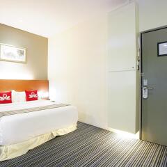 Отель Zen Rooms Changi Village Сингапур комната для гостей фото 2