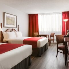 Отель Travelodge by Wyndham Hotel & Convention Centre Quebec City Канада, Квебек - отзывы, цены и фото номеров - забронировать отель Travelodge by Wyndham Hotel & Convention Centre Quebec City онлайн комната для гостей фото 5