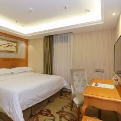 Отель Vienna Hotel Zhongshan Bus Station Китай, Чжуншань - отзывы, цены и фото номеров - забронировать отель Vienna Hotel Zhongshan Bus Station онлайн комната для гостей фото 3