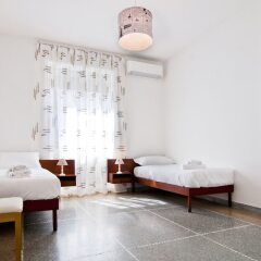 Отель Villa Aquari Cozy Apartment Италия, Рим - отзывы, цены и фото номеров - забронировать отель Villa Aquari Cozy Apartment онлайн комната для гостей фото 5