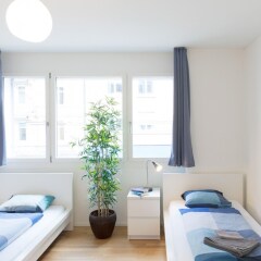Апартаменты HITrental Kreuzplatz Apartments Цюрих комната для гостей фото 5