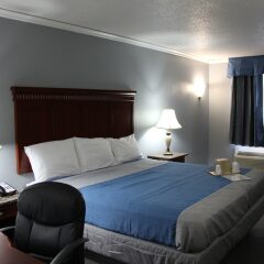 Отель Quarters Inn & Suites комната для гостей фото 5