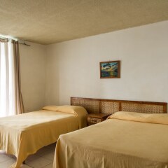 Отель Sunset Beach Studio At Montego Bay Club Resort Ямайка, Монтего-Бей - отзывы, цены и фото номеров - забронировать отель Sunset Beach Studio At Montego Bay Club Resort онлайн комната для гостей фото 5