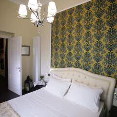 Апартаменты Agamennone Apartment Сиракуза комната для гостей фото 4