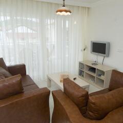 Апартаменты Orka Center Point Apartments Олудениз комната для гостей