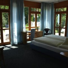 Отель Villa Waldperlach Германия, Мюнхен - отзывы, цены и фото номеров - забронировать отель Villa Waldperlach онлайн комната для гостей фото 4