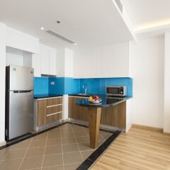 Comodo Nha Trang Hotel в номере фото 2