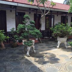 Отель Bonsai Homestay Хойан
