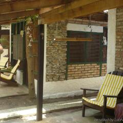 Отель Caribbean Coral Inn Tela Гондурас, Тела - отзывы, цены и фото номеров - забронировать отель Caribbean Coral Inn Tela онлайн вид на фасад