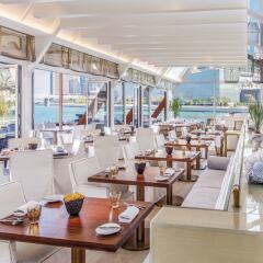 Отель Beach Rotana All Suites питание фото 2