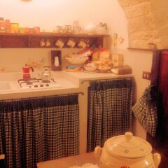 Отель Miratrulli & Trullo dell'Aia Альберобелло питание