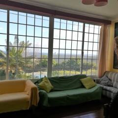 Отель Family Holiday Villa Vacations Ponta Delgada Португалия, Понта-Делгада - отзывы, цены и фото номеров - забронировать отель Family Holiday Villa Vacations Ponta Delgada онлайн интерьер отеля