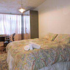 Отель NY072 2 Bedroom Apartment By Senstay США, Нью-Йорк - отзывы, цены и фото номеров - забронировать отель NY072 2 Bedroom Apartment By Senstay онлайн комната для гостей фото 5