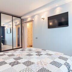 Апартаменты 4You Piter OnE Apartments Санкт-Петербург комната для гостей