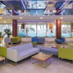 Caprici Hotel интерьер отеля