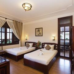 Lotus Hoi An Boutique Hotel & Spa Хойан комната для гостей фото 5