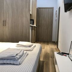 Отель Mitropoleos Charming Studio Греция, Салоники - отзывы, цены и фото номеров - забронировать отель Mitropoleos Charming Studio онлайн комната для гостей