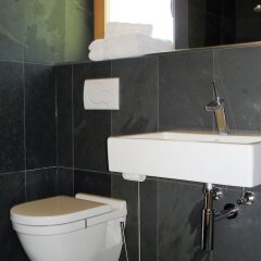 Отель Appartements Prairerhof Сцена ванная фото 2
