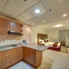 Al Manar Grand Hotel Apartment в номере
