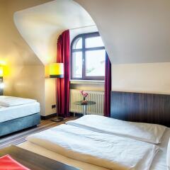 Leonardo Hotel & Residenz München комната для гостей фото 13