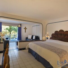 Отель Los Arcos Suites Пуэрто-Вальярта комната для гостей фото 5