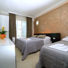 Отель Palazzo Greco Vacanze Порто Чезарео комната для гостей