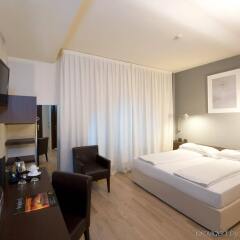 I Portici Hotel Bologna комната для гостей
