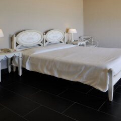 Отель Falconara Charming House & Resort Бутера комната для гостей