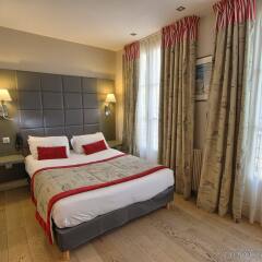 Отель Hôtel Villa Margaux сейф в номере