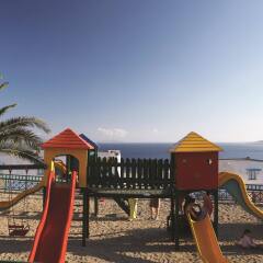 Отель Mitsis Family Village Beach Hotel Греция, Калимнос - отзывы, цены и фото номеров - забронировать отель Mitsis Family Village Beach Hotel онлайн приотельная территория