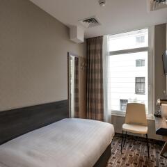 Отель Inner Amsterdam Нидерланды, Амстердам - - забронировать отель Inner Amsterdam, цены и фото номеров комната для гостей фото 4