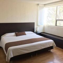 Отель Grupo Kings Suites Magnolia Мехико комната для гостей фото 5