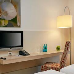 Отель H+ Hotel München Германия, Мюнхен - отзывы, цены и фото номеров - забронировать отель H+ Hotel München онлайн удобства в номере фото 2