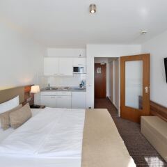 Vi Vadi Hotel downtown munich комната для гостей фото 11