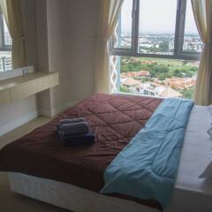 Апартаменты Grande Caribbean Pattaya Apartment Паттайя комната для гостей фото 3