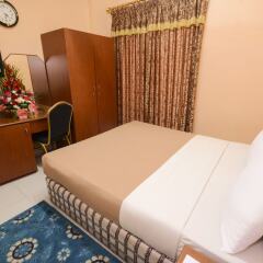 OYO 166 Melody Queen Hotel Дубай комната для гостей фото 5