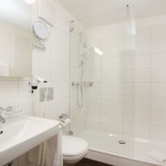 Отель Central Swiss Quality Apartments Швейцария, Давос - отзывы, цены и фото номеров - забронировать отель Central Swiss Quality Apartments онлайн ванная фото 2