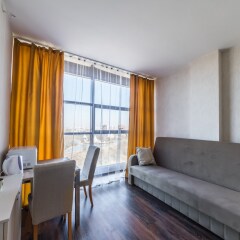 Апартаменты "Салют Плюс" комната для гостей фото 5