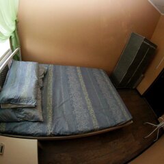 Гостиница Tikhy Tchas Nikitskaya Capsule - Hostel в Москве отзывы, цены и фото номеров - забронировать гостиницу Tikhy Tchas Nikitskaya Capsule - Hostel онлайн Москва комната для гостей фото 5