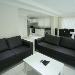 Апартаменты Orka Royal Hills Apartment Олудениз комната для гостей