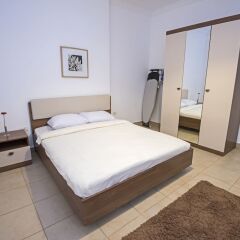 Апартаменты Lilly apartments комната для гостей фото 5