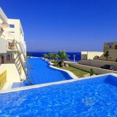 Отель Mitsis Family Village Beach Hotel Греция, Калимнос - отзывы, цены и фото номеров - забронировать отель Mitsis Family Village Beach Hotel онлайн бассейн фото 3