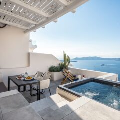 Отель Porto Fira Suites бассейн фото 2