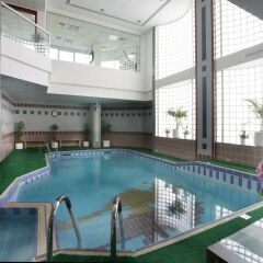 Отель Ramada Beach Аджман бассейн